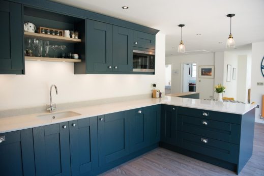 Blue shaker kitchen with peninsula